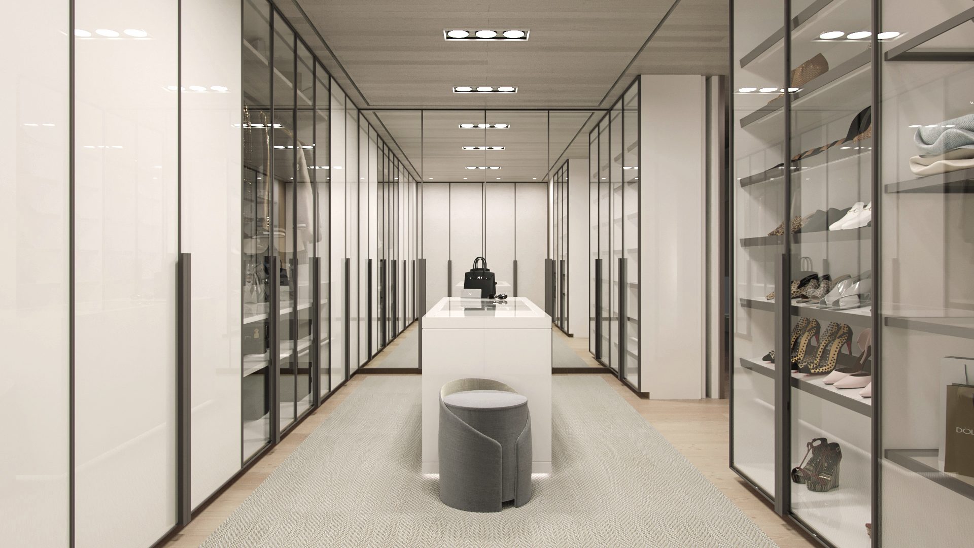 Walk-in dressing room with glass-front cabinetry and a center island